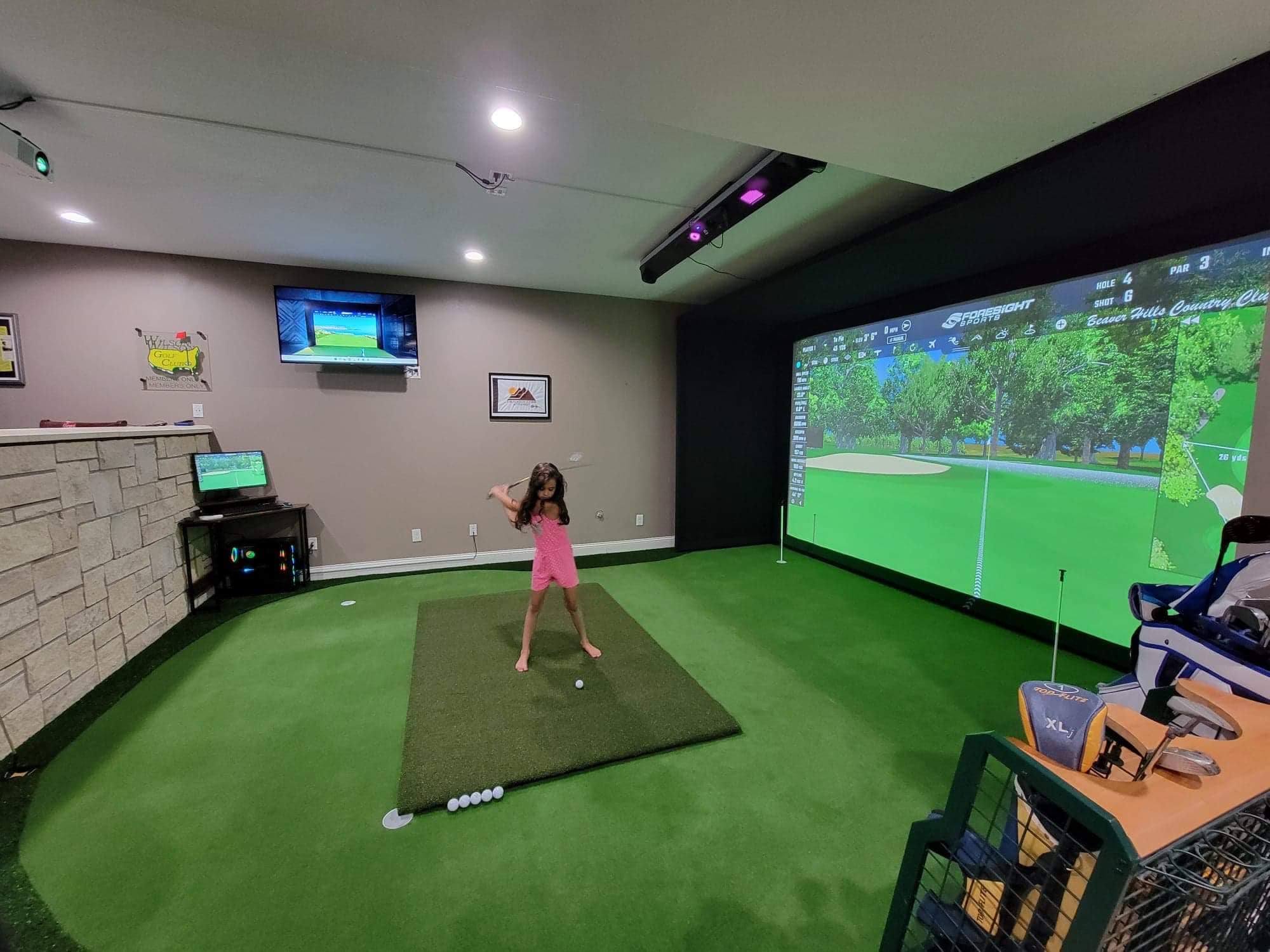 Midwest Golf Innovations - Simulator Kits - Young Girl playing golf